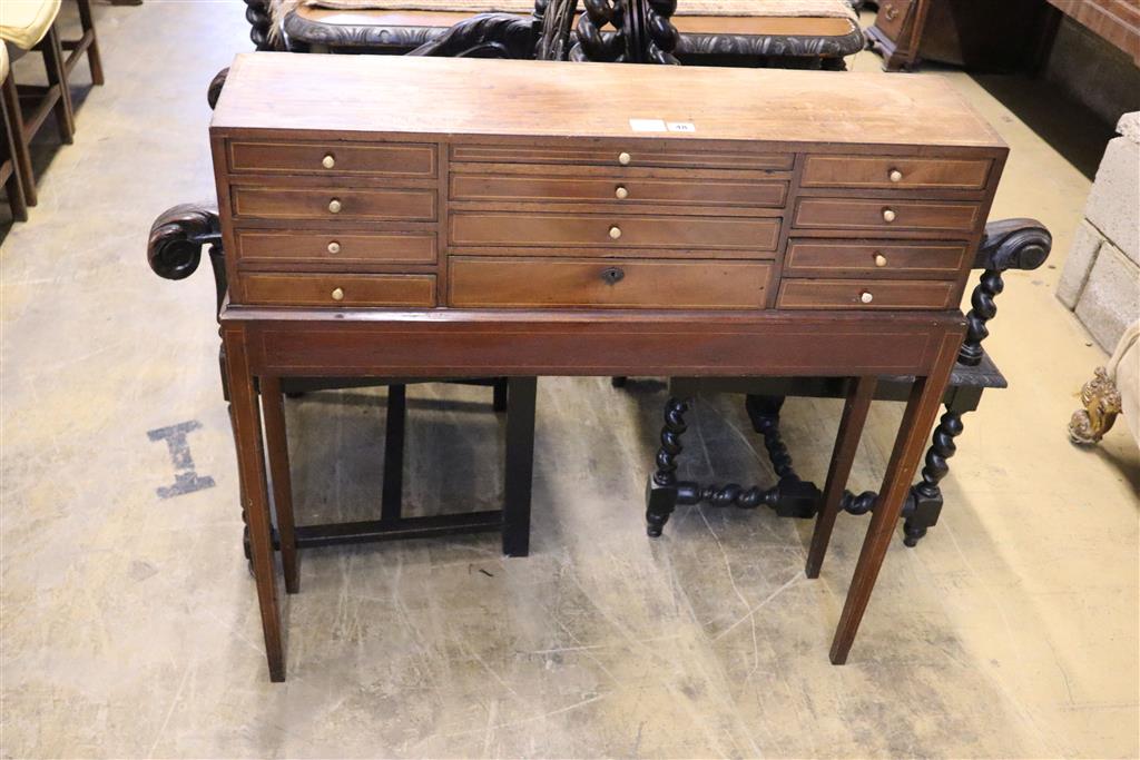 A George III mahogany chest on stand, width 99cm, depth 25cm, height 97cm